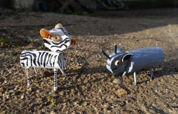Zèbre & rhino © Les Animalices
